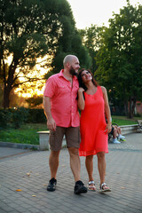  Beautiful mature couple on  summer evening at sunset