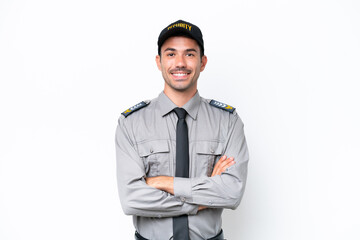 Young safeguard man over isolated white background keeping the arms crossed in frontal position