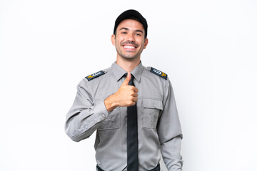Young safeguard man over isolated white background giving a thumbs up gesture