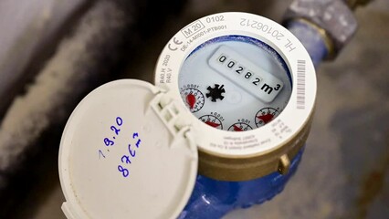 Analog water meter measures water consumption in cubic meters on an analog scale with running counter