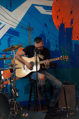 Obraz premium man with guitar