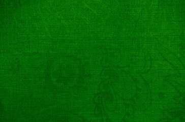 Green background from decorative plaster with abstract spots. Unusual green wall texture with beautiful patterns, creative surface background. Front covering for facing of buildings.