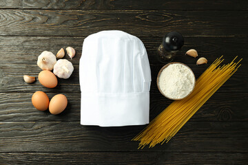 Composition with chef hat for concept of cooking, top view