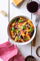 Pasta alla Norma with eggplant, tomatoes, cheese and basil. Italian food. Vegetarian food.