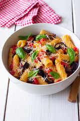 Pasta alla Norma with eggplant, tomatoes, cheese and basil. Italian food. Vegetarian food.