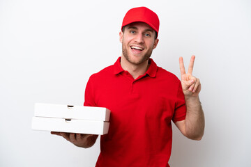 Pizza delivery caucasian man with work uniform picking up pizza boxes isolated on white background...