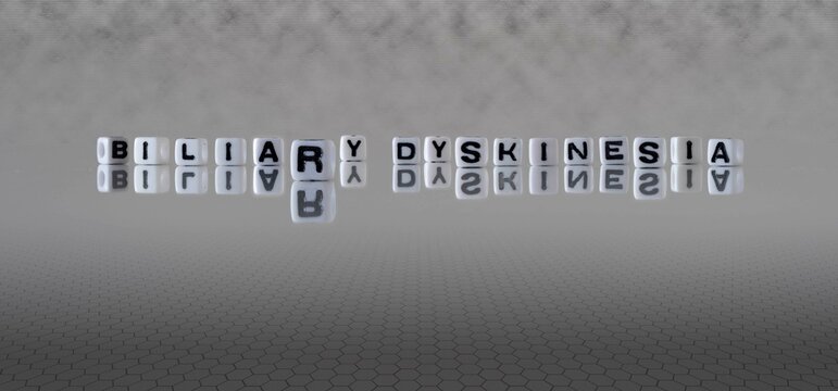 biliary dyskinesia word or concept represented by black and white letter cubes on a grey horizon background stretching to infinity