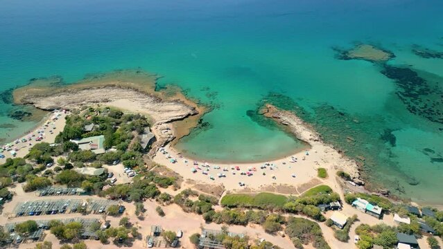 Spectacular crystal clear transparent water beach in Sardinia Italy aerial view with drone