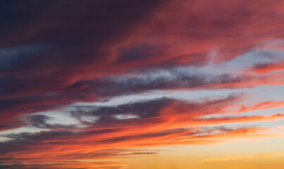 Naklejka na ściany i meble sky with clouds at sunset warm colors, beautiful sunset