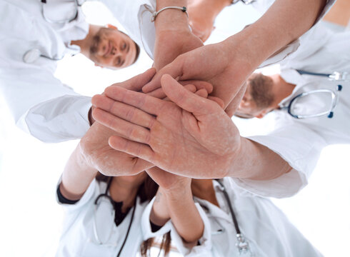 image of a group of diverse medical staff showing their unity.