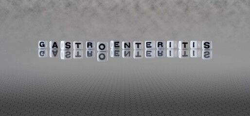 gastroenteritis word or concept represented by black and white letter cubes on a grey horizon background stretching to infinity