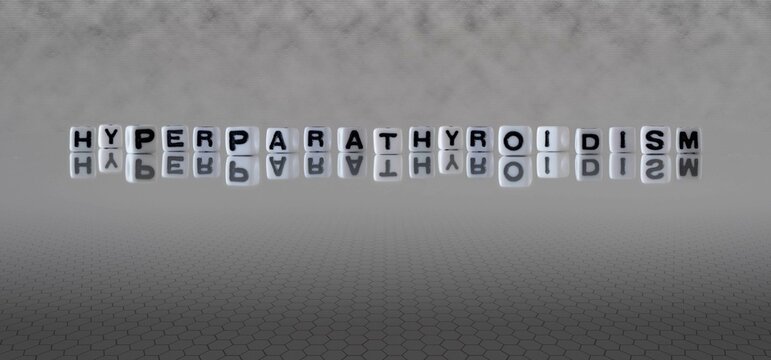 hyperparathyroidism word or concept represented by black and white letter cubes on a grey horizon background stretching to infinity
