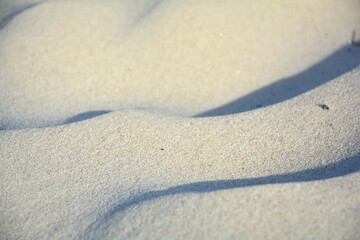 Ripple marks made of fine sand on beach by Baltic Sea