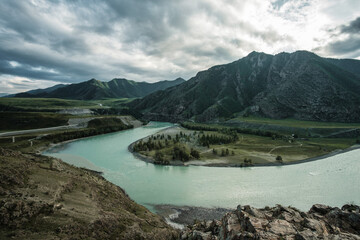Obraz na płótnie Canvas The confluence of the Chuya and Katun rivers in the Altai Mountains