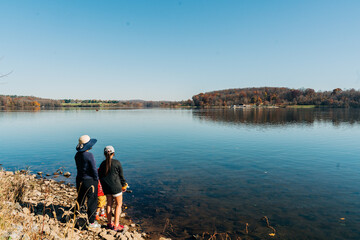 person walking on the lake
