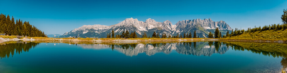 High resolution panorama with reflections in a lake at the famous Astberg summit, Going, Wilder...