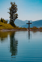 Beautiful alpine summer view with reflections in a lake at the famous Astberg summit, Going, Wilder Kaiser, Tyrol, Austria