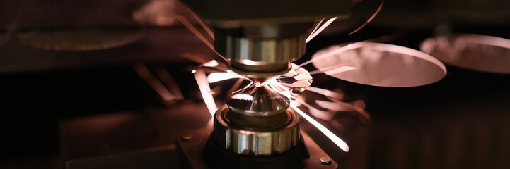Fototapeta na wymiar Metal head and sparks in metallurgical tool closeup