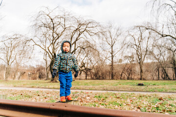 portrait of a child boy playing in fall