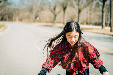 portrait of a girl playing in winter