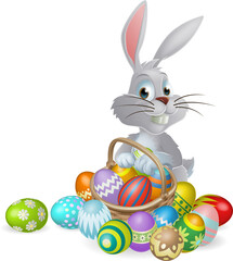 White Easter bunny and chocolate eggs