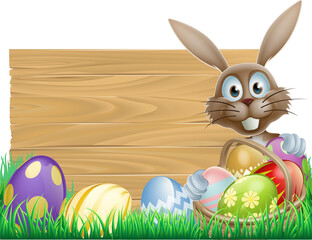 Happy Easter bunny and wooden sign