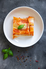 pasta casserole ziti lasagna tomato sauce, cheese fresh  meal food snack on the table copy space food background