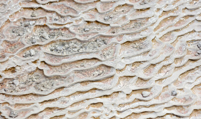 Emerald water in white limestone rock.