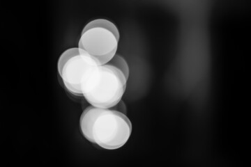 black and white bokeh lights. magical light, overlay or lens flare effect