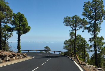 Road in the mountains with a view of the sea