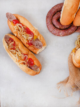 South African famous boerewors roll, flat lay with ingredients and copy space