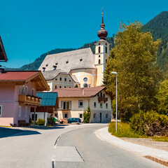 Fototapeta na wymiar Beautiful church on a sunny summer day at Waidring, Tyrol, Austria