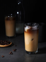 Cold coffee with ice in low key	