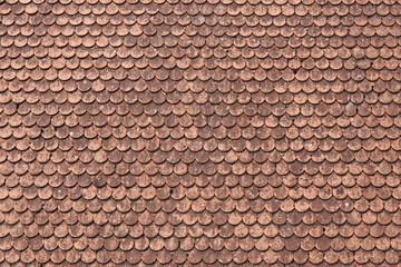 An old roof covered with ceramics tiles in Europe