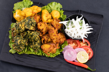 Mix Variety Of Indian Fritters Onion Pakoda, Gobi Pakodi, Gobhi Chop, Pyaz Ke Pakore, Kanda Bhajji,...