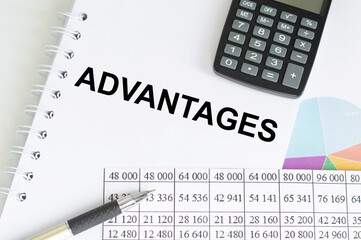 ADVANTAGES text on notebook on the chart background