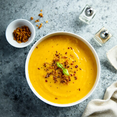 Traditional pumpkin soup with crunchy onion