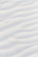 Fototapeta premium White sand texture. White sand background. vertical background 