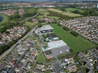 Fototapeta na wymiar aerial view of urban housing estate and community and st Andrews primary school Sutton Park Kingston upon Hull, Yorkshire 