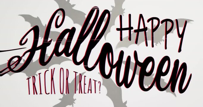 Animation of halloween text over spider and bats on grey background