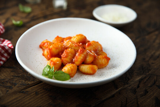 Traditional homemade potato gnocchi with tomato sauce