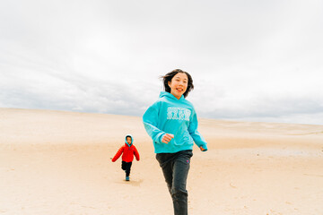 person walking on the beach