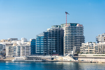 Sliema, Malta, 22 May 2022:  Modern business district of Sliema - obrazy, fototapety, plakaty