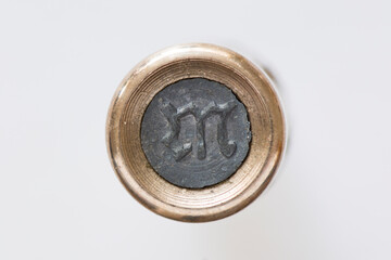 7,92-mm copper shell lead filled bullet bottom with hallmark gothic letter M from German rifle...