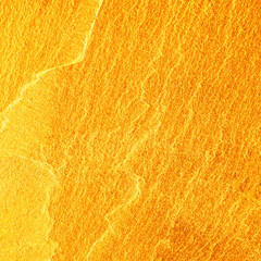 Gold stone texture for background. gold background