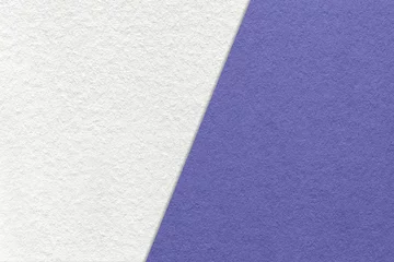 Papier Peint photo Lavable Pantone 2022 very peri Texture of craft white and very peri paper background, half two colors, macro. Structure of vintage violet cardboard.