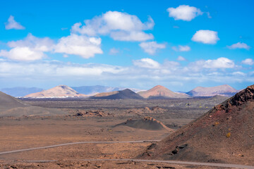 Fototapeta na wymiar Volcanic landscape of Timanfaya National Park, Lanzarote, Canary Islands, Spain