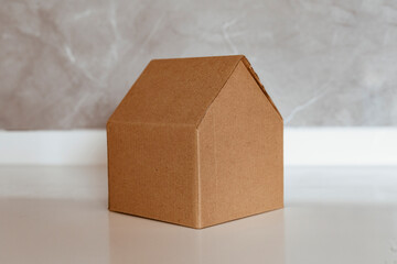 close up of house shape from cardboard