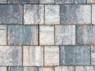 Close-up photo of the texture of the granite block wall