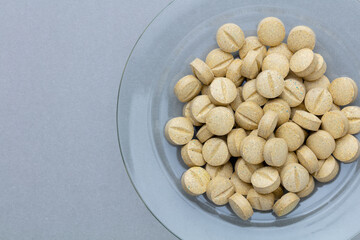 Homeopathic pill supplement. Alternative Medicine. Vitamin capsules.